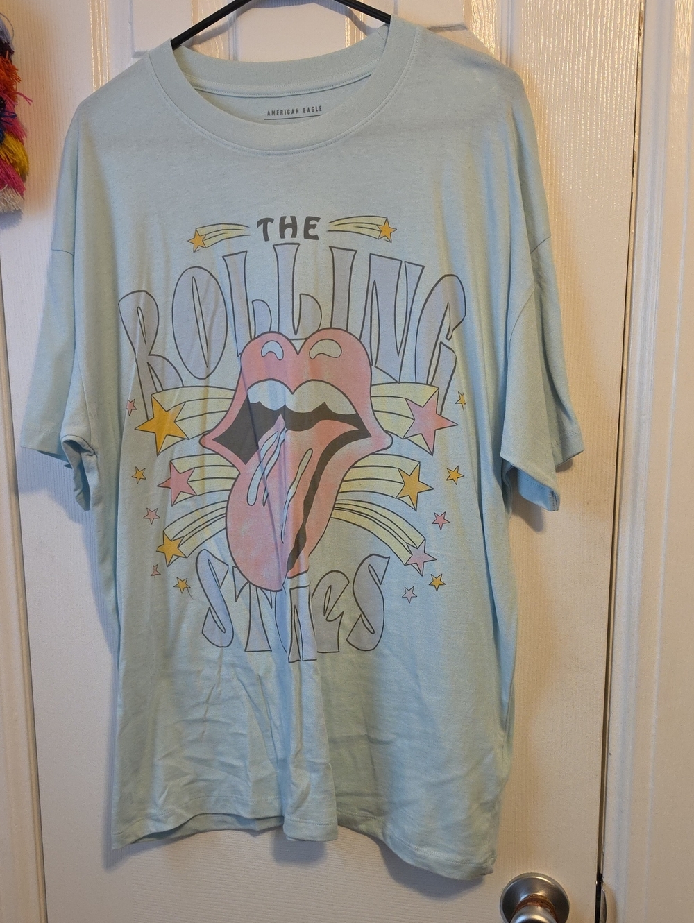 NWOT American Eagle Light Blue Rolling Stones Graphic Tee with Pink Accent